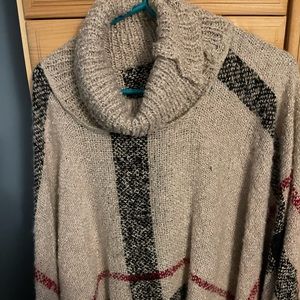 One size Sweater poncho from the Snooki Shop.  Worn once.